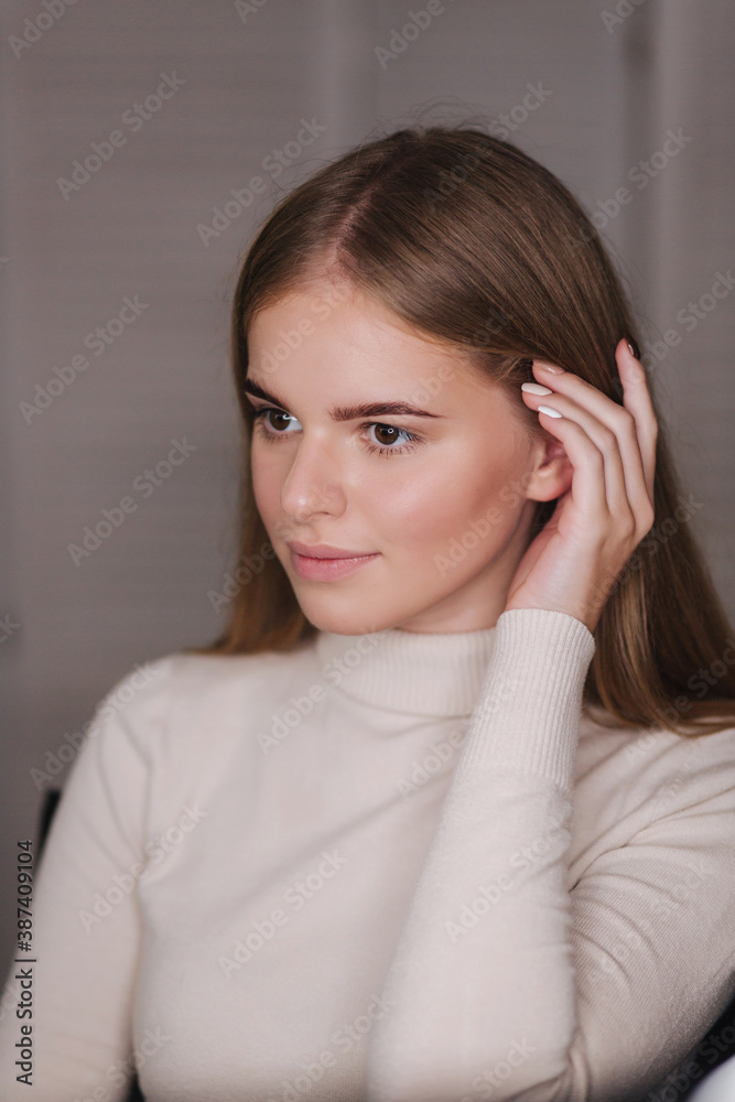 Portrait of beautiful blond hair woman with fresh dyed eyebrows. Female in beauty studio Portrait of beautiful blond hair woman with fresh dyed eyebrows. Female in beauty studio