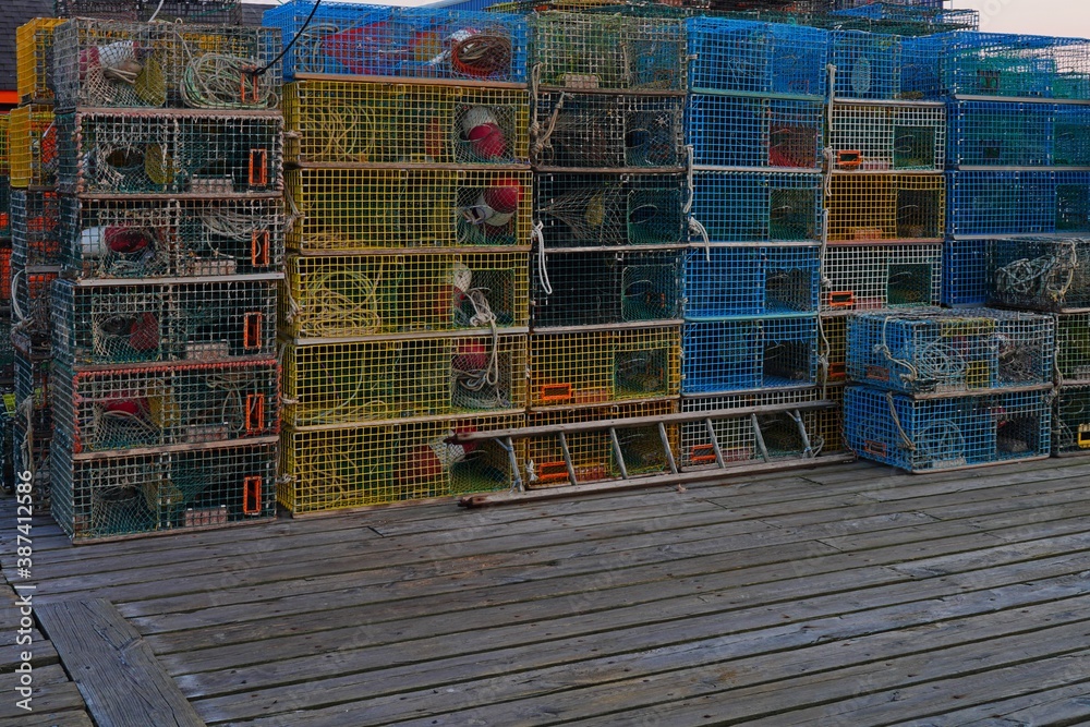 View of stacks of lobster traps in Maine, United States View of stacks of lobster traps in Maine, United States