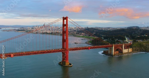 High aerial view of the Golden Gate Bridge. San Francisco, US. It connects the San Francisco peninsula to Marin County.  US route 101  and SR 1 full of traffic. Shot on Red weapon 8K. photo