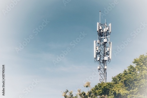 Telecommunications antennas, radio and satellite communication technology, telecommunications industry Mobile network or telecommunications 4g 5g separated from the blue background