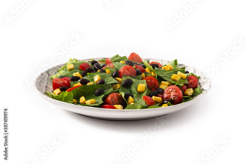 Mexican salad with black beans, corn,tomatoes,lettuce and pepper isolated on white background
