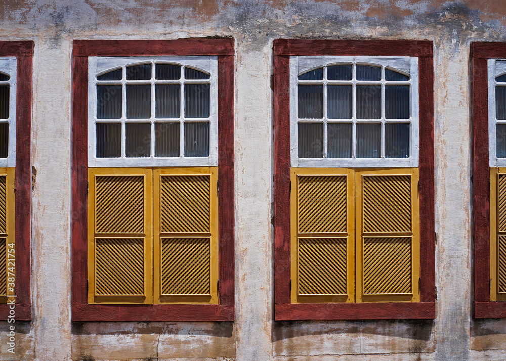 Ancient colonial windows in historical city of Ouro Preto, Brazil Ancient colonial windows in historical city of Ouro Preto, Brazil