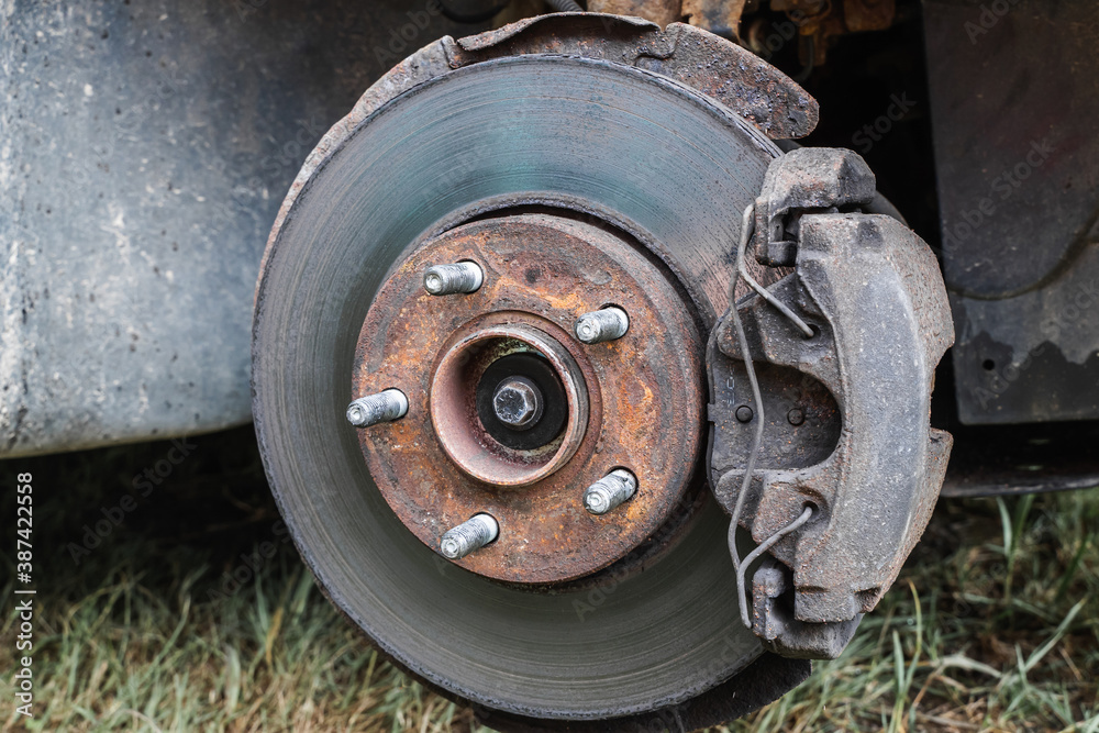 Rear wheel car suspension. Brake disc and wheel hub of a car. Stock photo Rear wheel car suspension. Brake disc and wheel hub of a car. Stock photo