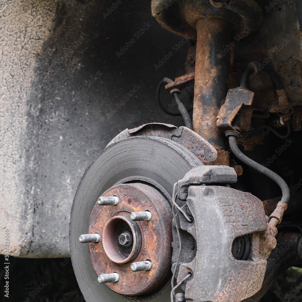 Rear wheel car suspension. Brake disc and wheel hub of a car. Stock photo Rear wheel car suspension. Brake disc and wheel hub of a car. Stock photo