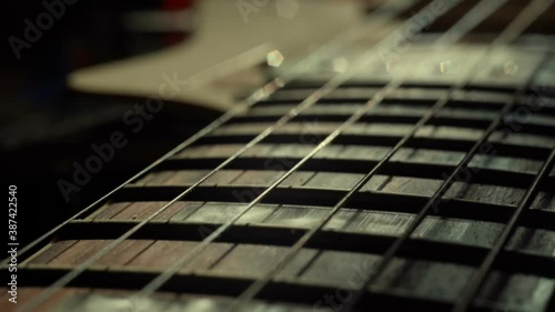 Guitar neck, extreme close up.Guitar Strings And Frets For Making Music