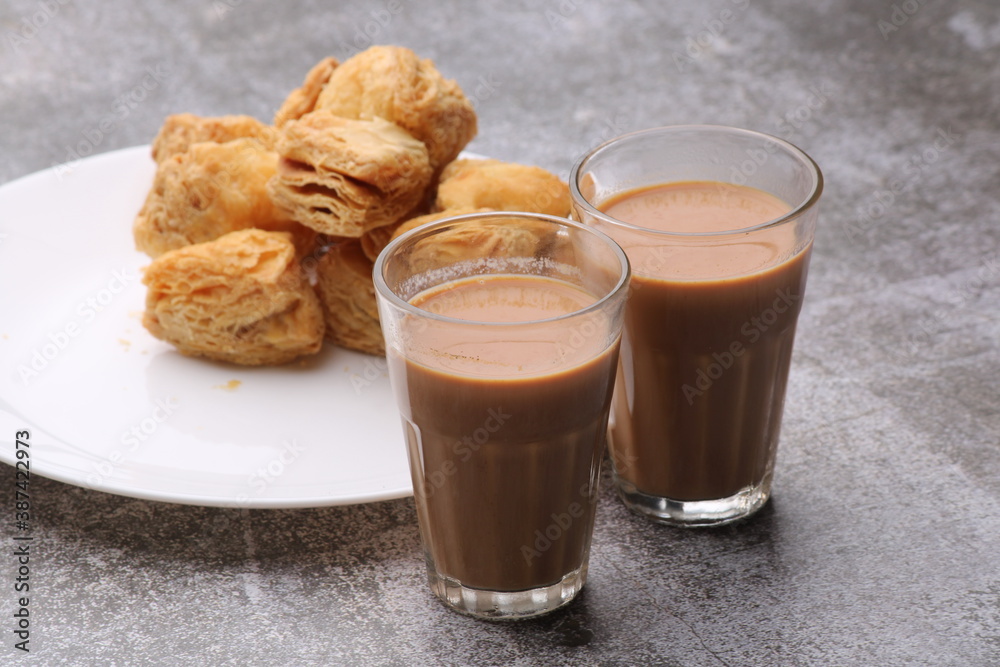 indian khari or kharee or salty Puff Pastry Snacks, served with indian hot tea. indian khari or kharee or salty Puff Pastry Snacks, served with indian hot tea.