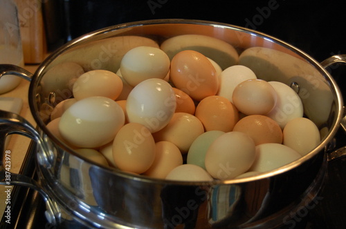 farm eggs steaming in pan