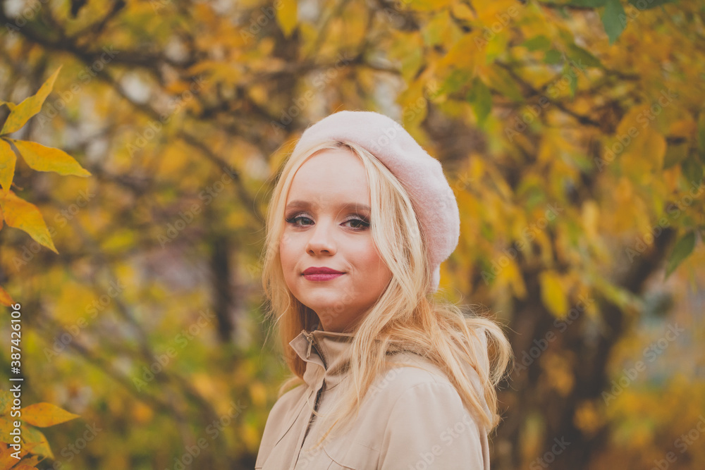 Pretty autumn woman on fall nature background Pretty autumn woman on fall nature background