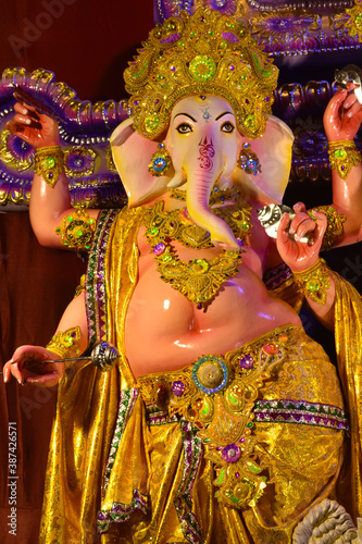 Close up Ganesha statue and Golden texture ganesh is hindu god god of Success.