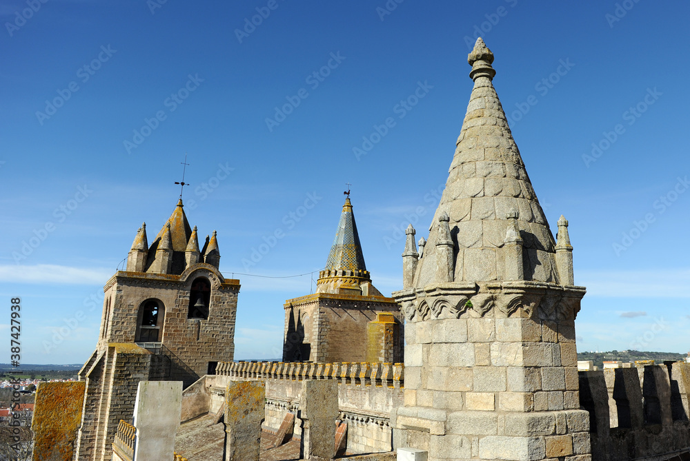 Roofs and steeples of Cathedral of Nossa Senhora da Assuncao in Evora. World Heritage City by Unesco. Alentejo Region, Portugal. 