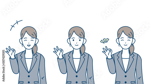 ビジネスウーマン　会社員　スーツ姿の女性　OKサイン