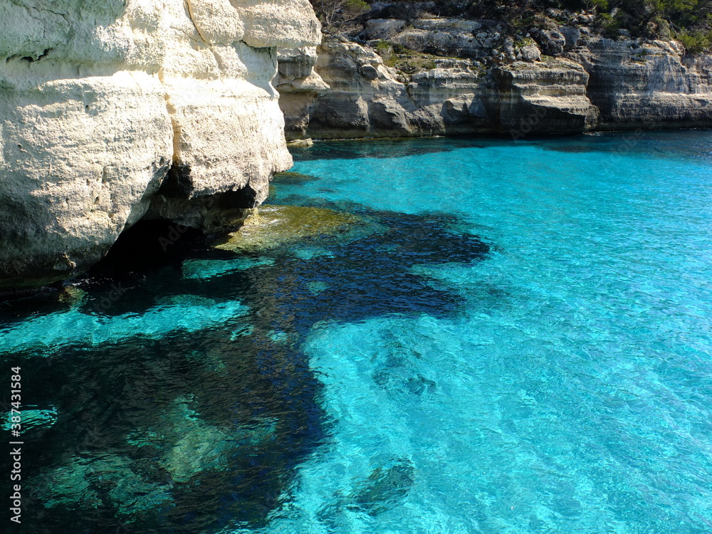 blue mediterranean sea and rocks