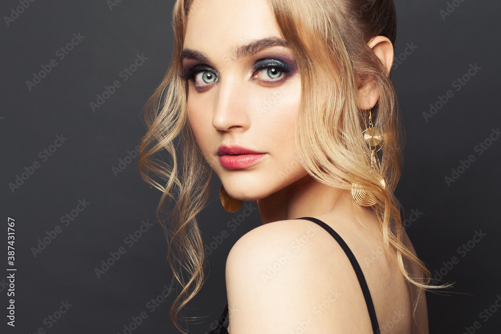 Fashion beauty portrait of perfect woman with blonde hairdo and makeup on black background - obrazy, fototapety, plakaty 