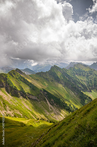 Landscape with Swiss Alps mountains and green nature. Photo taken at Fluebrig.