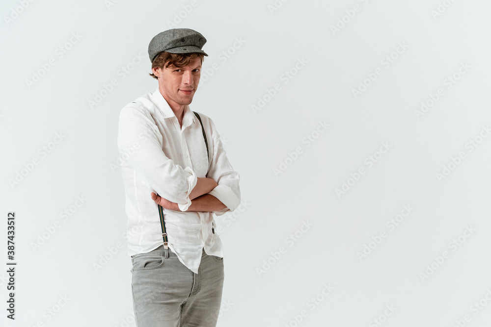 Hipster Man Stands With His Hands Folded. Cut out on white background. Copy space. Hipster Man Stands With His Hands Folded. Cut out on white background. Copy space.