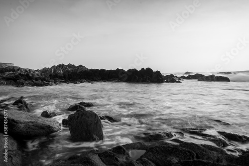 black and white rocks at the beach