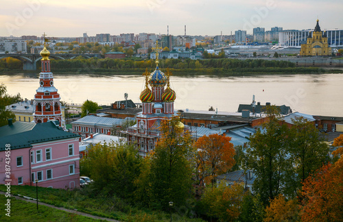 Autumn sunset in Nizhny Novgorod and a view of the mosaic domes of Orthodox churches photo