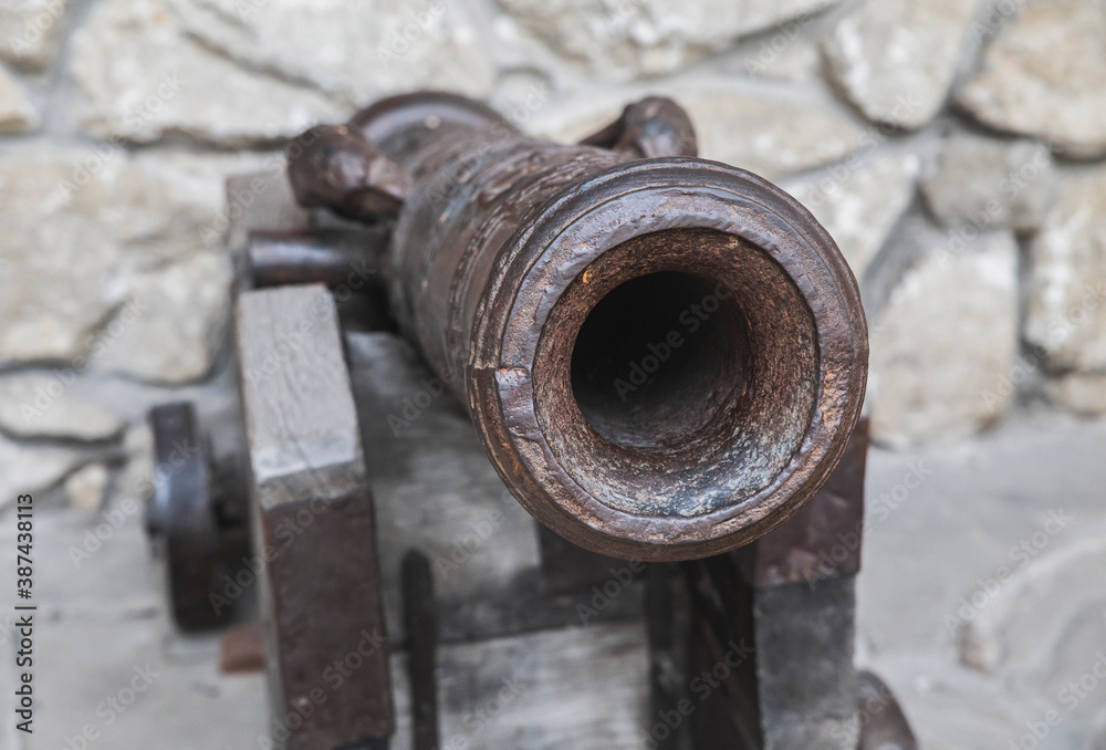 medieval cannon in an old abandoned castle