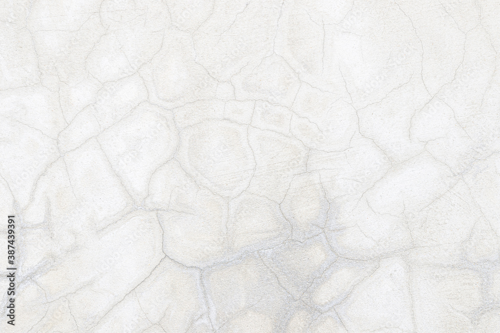 abstract of cement cracked texture on old white masonry wall abstract of cement cracked texture on old white masonry wall