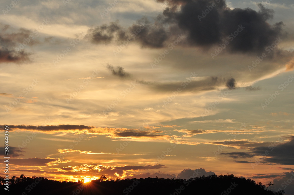 Beautiful golden yellow sky and sun