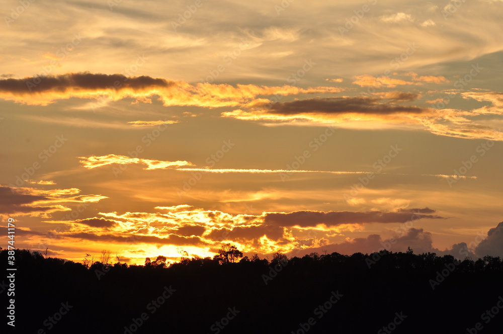 Beautiful golden yellow sky and sun