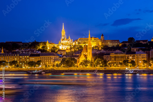 Panorama of Budapest at night on the Danube River, Hungary