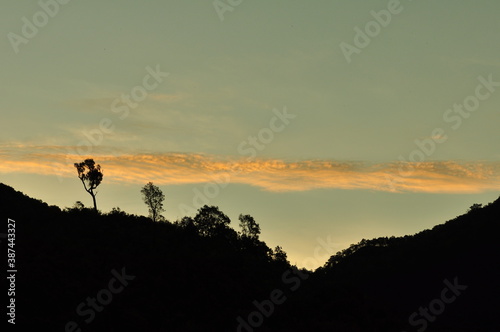 Sunset over the mountain whit orange sky