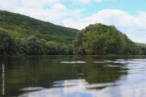 Very beautiful river water surface. Natural green background. photo