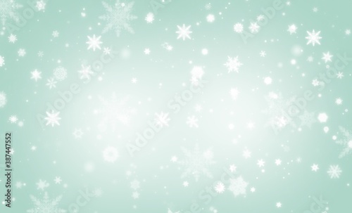 Green abstract background. white light and snowflakes bokeh winter for Christmas new year blurred beautiful shiny lights use for card banner wallpaper backdrop and your product. © Khaohom Mali