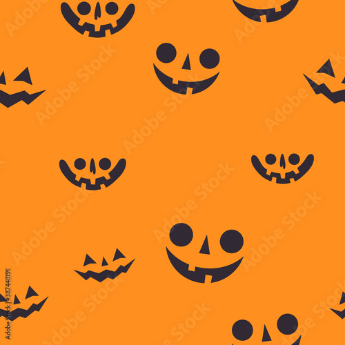 Halloween pumpkin faces seamless pattern. Carved pumpkins texture background.