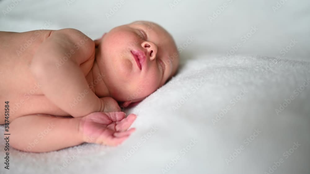 Cute emotional funny yawning newborn little baby boy sleeping in crib. Baby goods packaging template. Healthy child, concept of hospital and happy motherhood. Infant baby. Nursery. Cute emotional funny yawning newborn little baby boy sleeping in crib. Baby goods packaging template. Healthy child, concept of hospital and happy motherhood. Infant baby. Nursery.