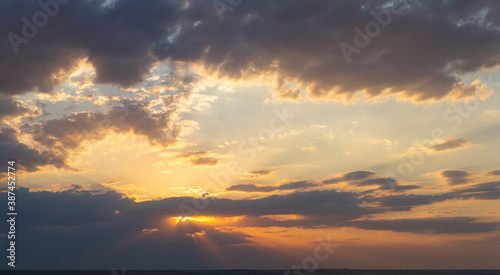 The evening sunset. Panorama. Majestic Storm Clouds. Tragic gloomy sky.