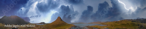 Storm approaching Kirkjufell Mountain, panoramic aerial view