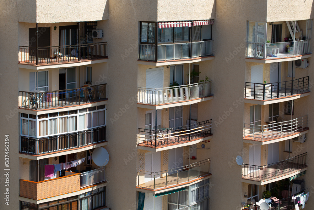 View from a multi-storey building to the balcony of a neighboring house in Spain