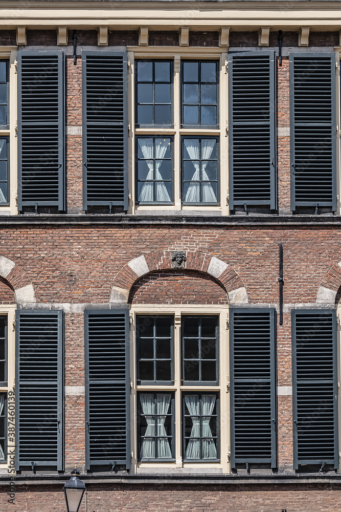 Obraz premium Fragments of the Binnenhof (Inner court) building - XIII century complex of buildings in the city center of Den Haag (The Hague). Netherlands.