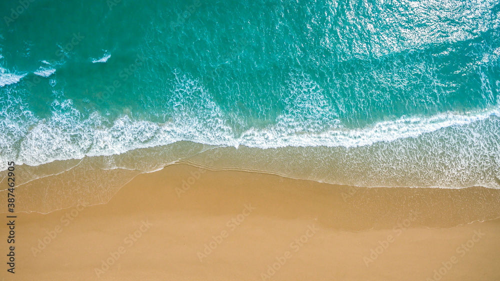 Top view aerial image from drone of an stunning beautiful sea landscape beach with turquoise water with copy space for your text. Beautiful Sand beach with turquoise water, aerial UAV drone shot