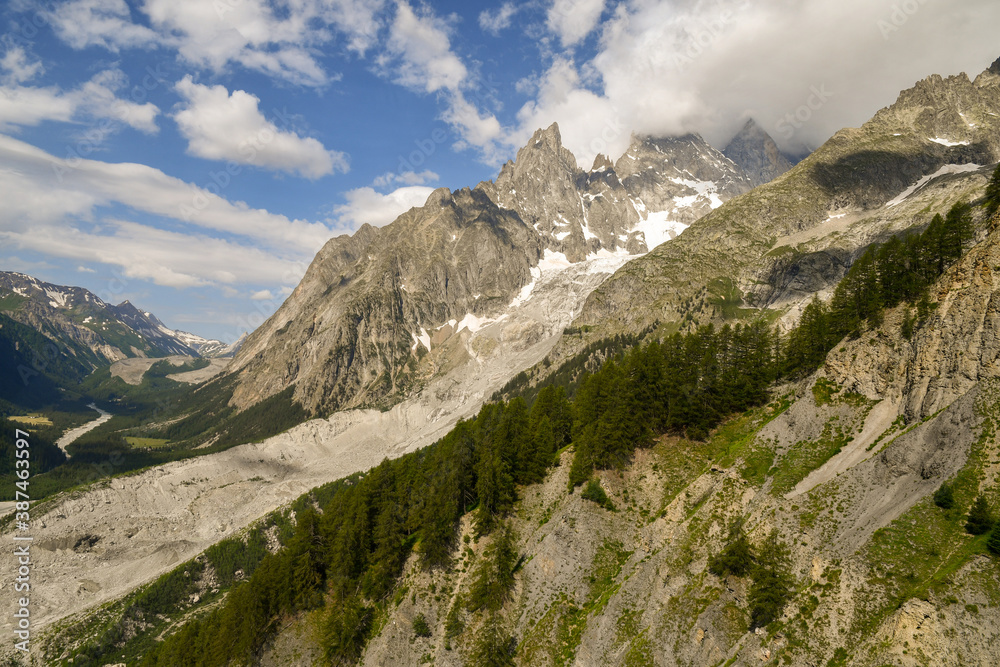 Scenic view of the massif of Mont Blanc with the Aiguille Noire de Peuterey peak and the Val Veny valley in summer, Courmayeur, Aosta Valley, Alps, Italy