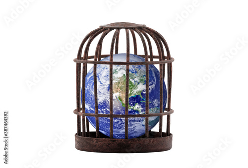 Planet Earth trapped in old rusty cage isolated on white. Lockdown concept. Earth photo provided by Nasa.
