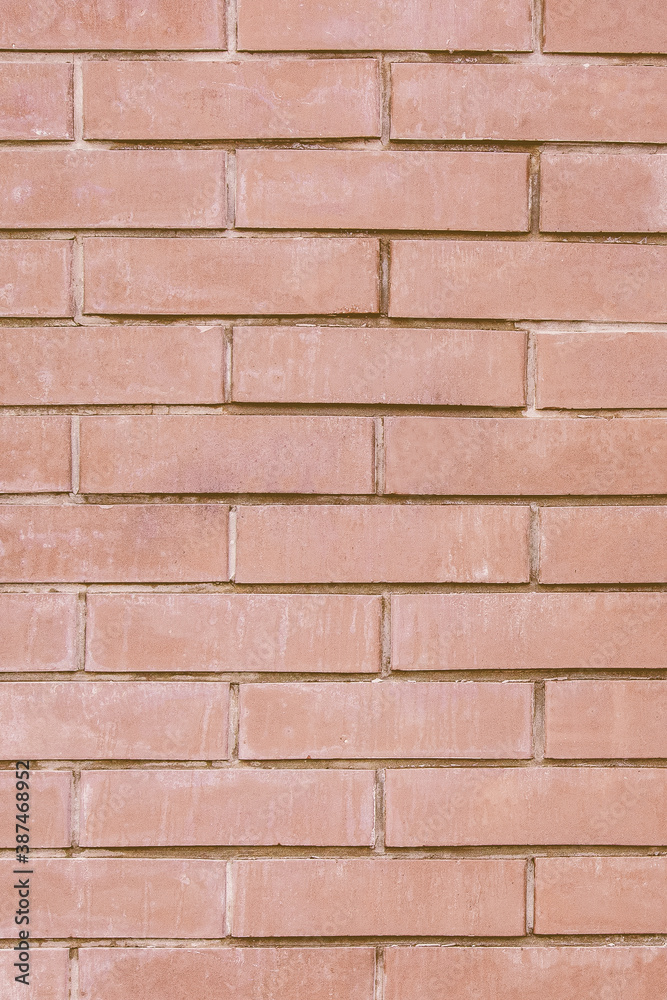 Fototapeta premium Brick wallpaper, texture. Background for creative design. There are scuffs on the aged surface.