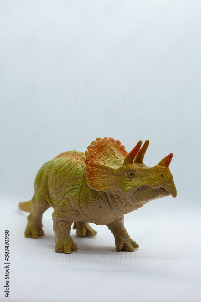 Obraz premium dinosaur toy isolated on white