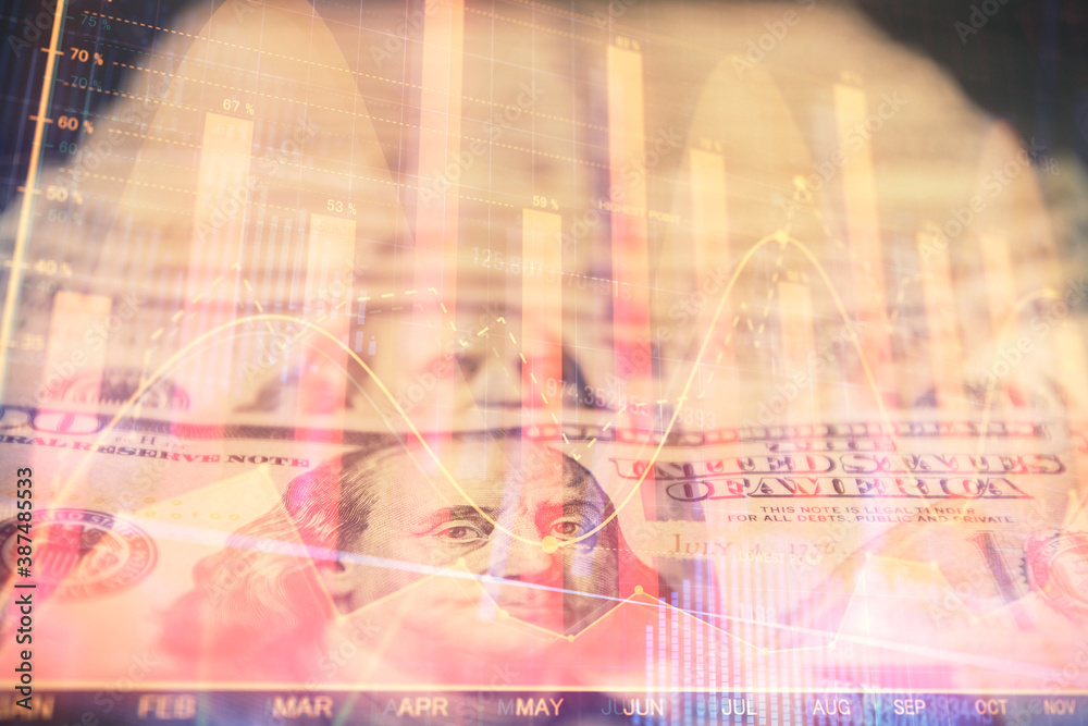 Double exposure of forex graph drawing over us dollars bill background. Concept of financial markets. Double exposure of forex graph drawing over us dollars bill background. Concept of financial markets.