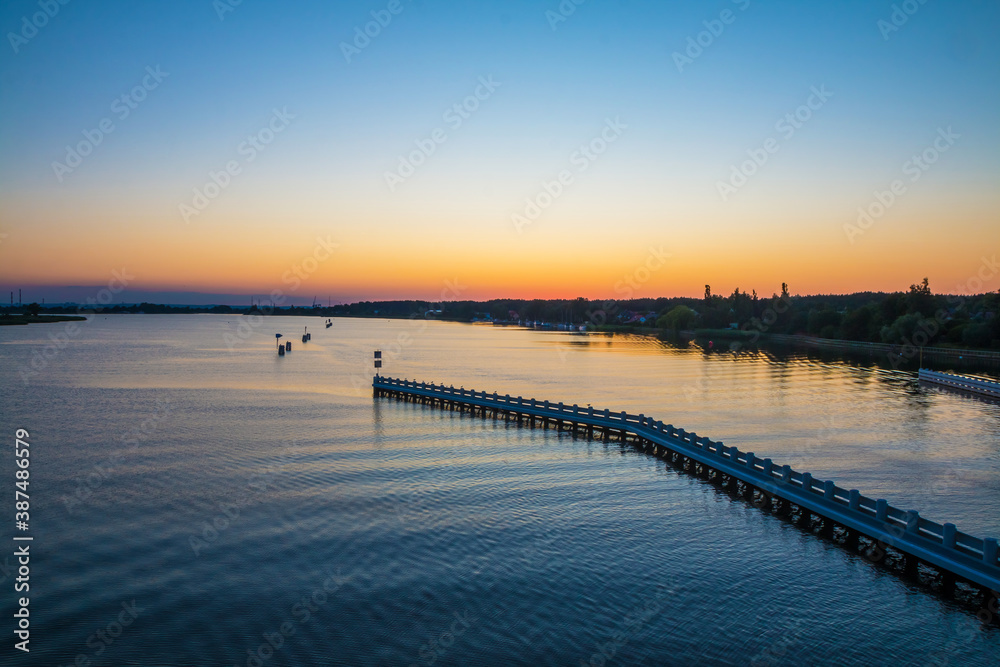 Fototapeta premium Bridge over the river “Dead Vistula” in Sobieszewo / Poland