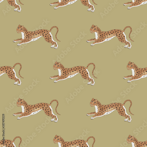 Photography Seamless geometrical animal pattern with stylized running spotted wild cats or leopards