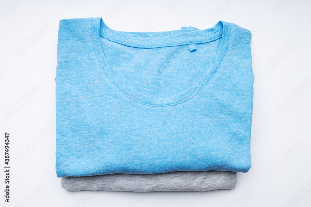 blank folded t-shirt on a white background. branding template. above view blank folded t-shirt on a white background. branding template. above view