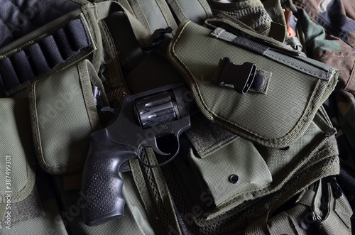 Firearms. Revolver in the holster - selective focus