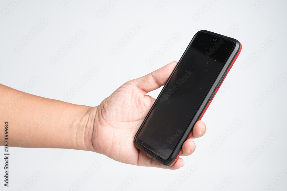 Hand holding old smartphone with dust and dirty screen on white background Hand holding old smartphone with dust and dirty screen on white background