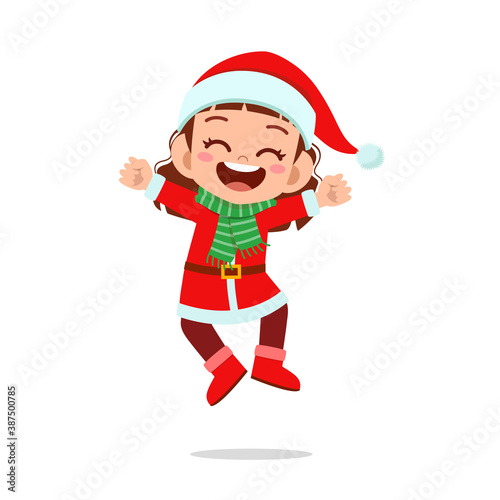 happy cute little kid boy and girl wearing red christmas costume and jump