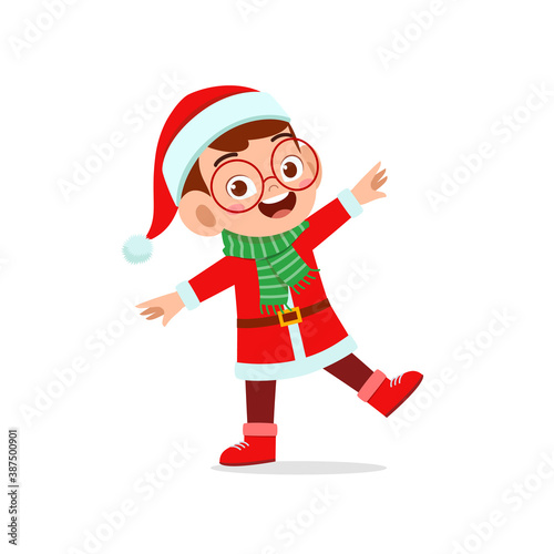 happy cute little kid boy and girl wearing red christmas costume