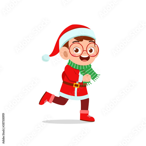 happy cute little kid boy and girl wearing red christmas costume