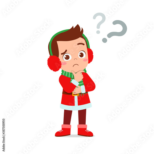 happy cute little kid boy and girl wearing red christmas costume and thinking